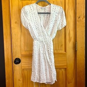 Size M black and white silky dress never worn. Olivaceous brand